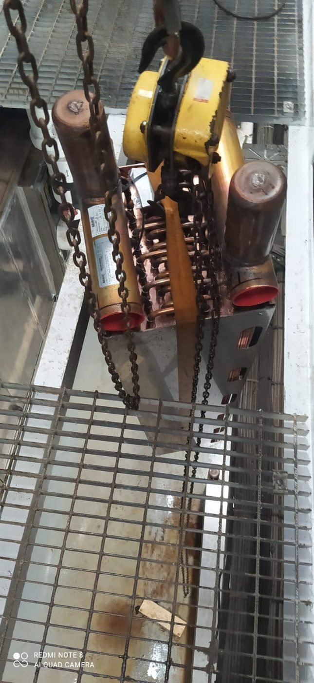 Coil handling — Chain-block rigging over grating